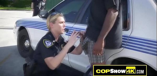  Public threeway with a black criminal and two busty MILF officers.